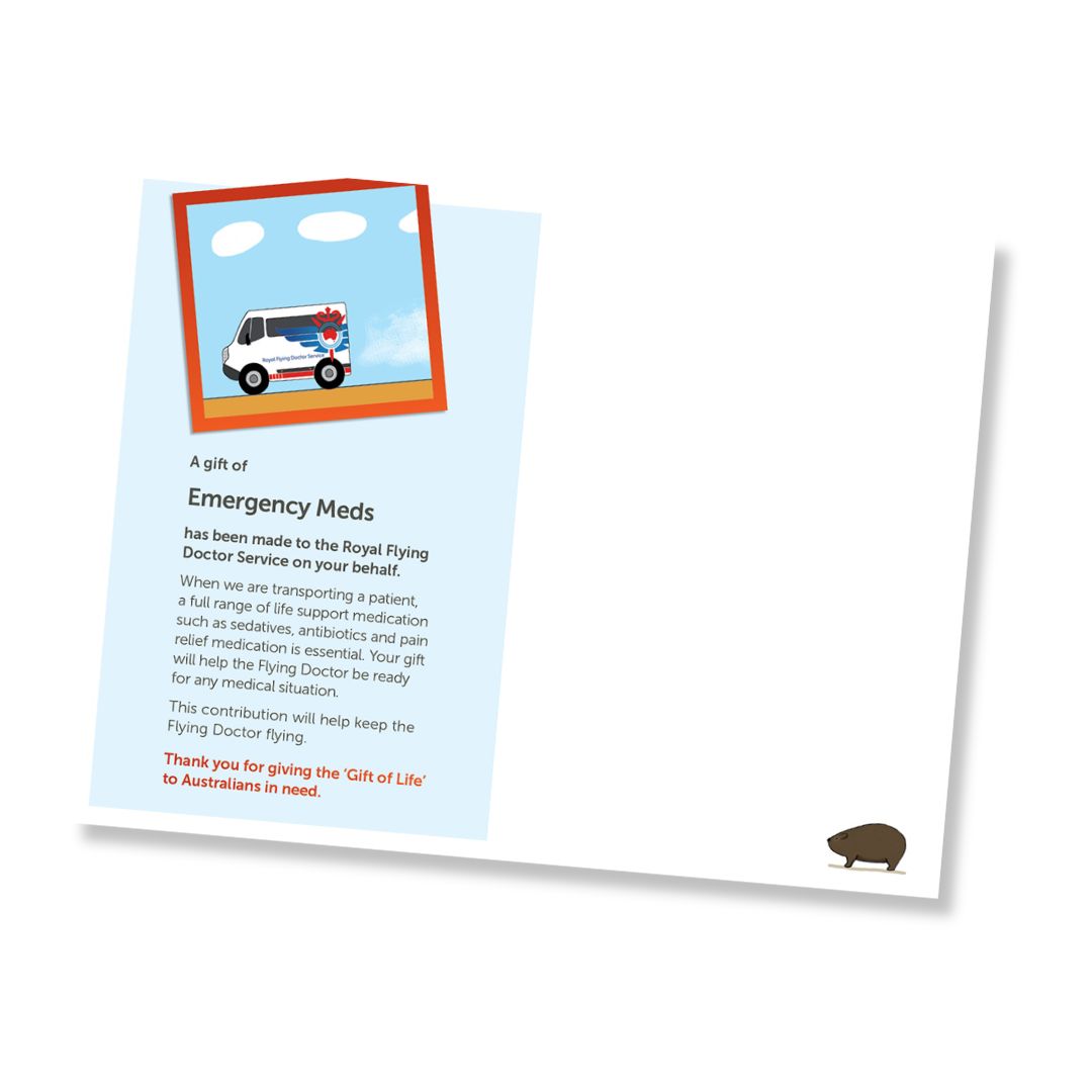 Inside of a card for a donation of emergency meds to the Royal Flying Doctor Service, shown at an angle on a white background. The card has a light blue border, black text, a small illustration of a white ambulance with red cross details, and a small brown wombat near the bottom right.