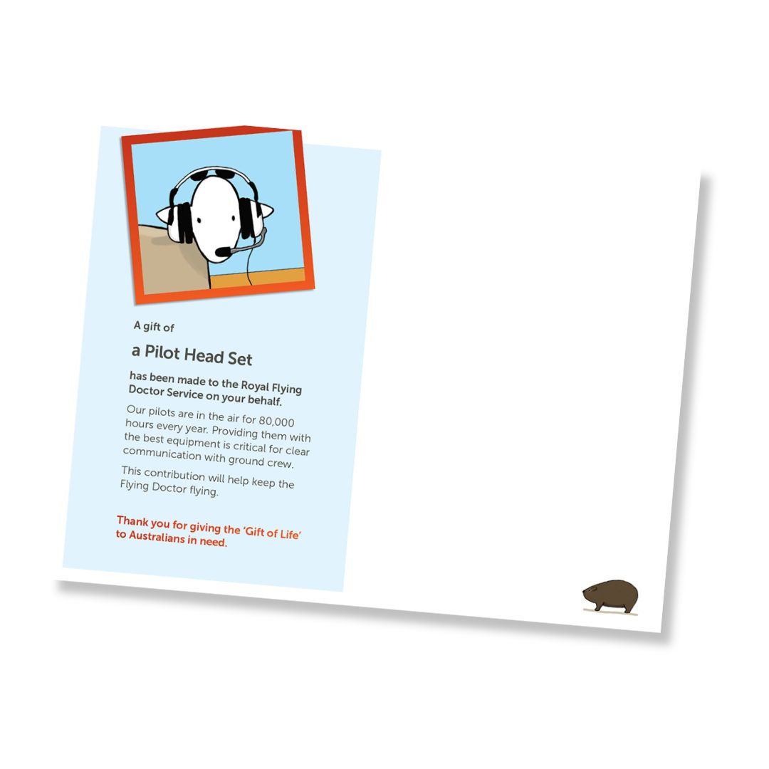 Inside of a card for a pilot head set donation to the Royal Flying Doctor Service, shown at an angle on a white background. The card features a light blue background with text, an illustration of a sheep wearing a pilot head set, and a small brown wombat in the bottom right corner.