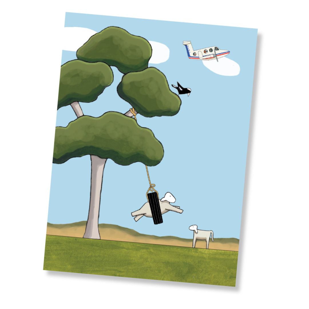 A greeting card featuring a whimsical illustration of a tree with a hanging black tyre swing, a small RFDS plane in the sky, a magpie, and two white sheep on a grassy hill under a light blue sky.