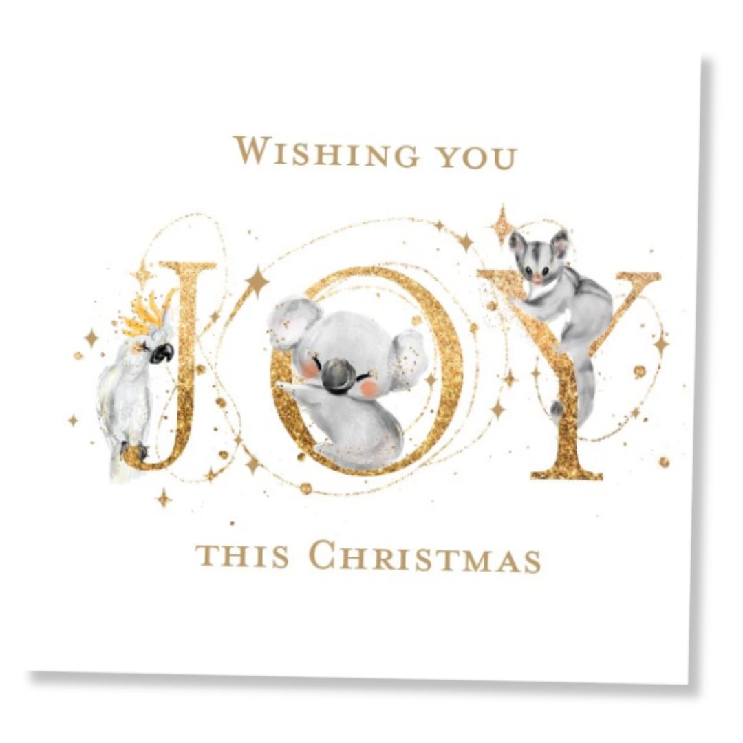 Square Christmas card with Australian animals and gold glitter text 'Wishing you JOY this Christmas' on a white background.