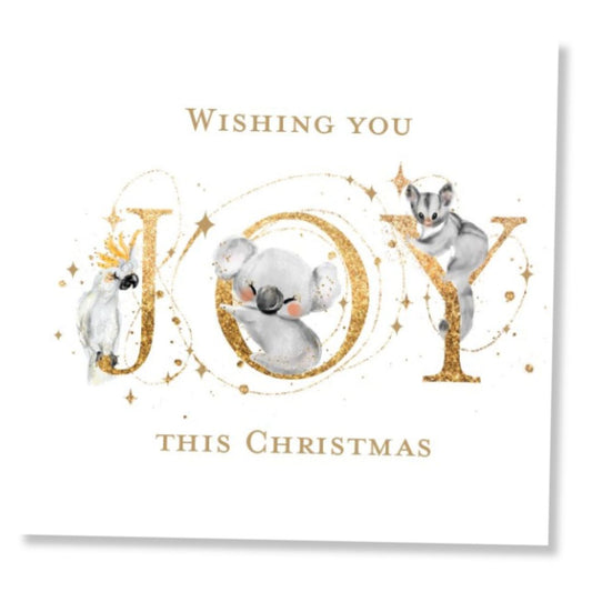 Square Christmas card with Australian animals and gold glitter text 'Wishing you JOY this Christmas' on a white background.